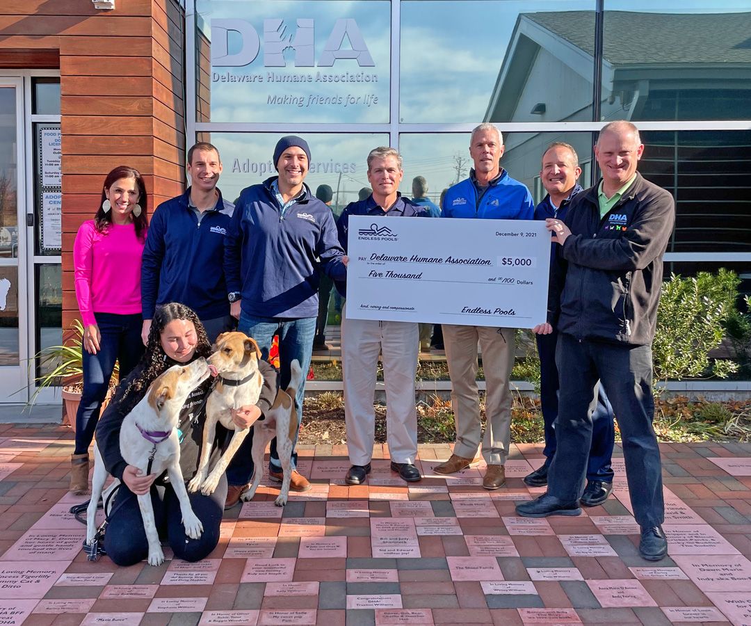 picture of donation ceremony for Endless Pools gift to Delaware Humane Association
