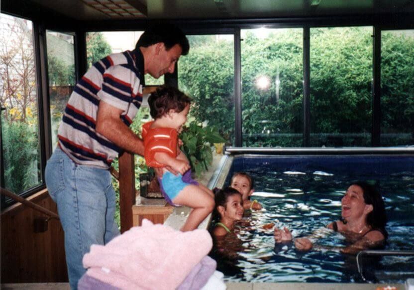 Fran Kaplan and her family in the Endless Pool in their sunroom