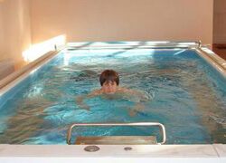 picture of Judith in her Endless Pools indoor pool