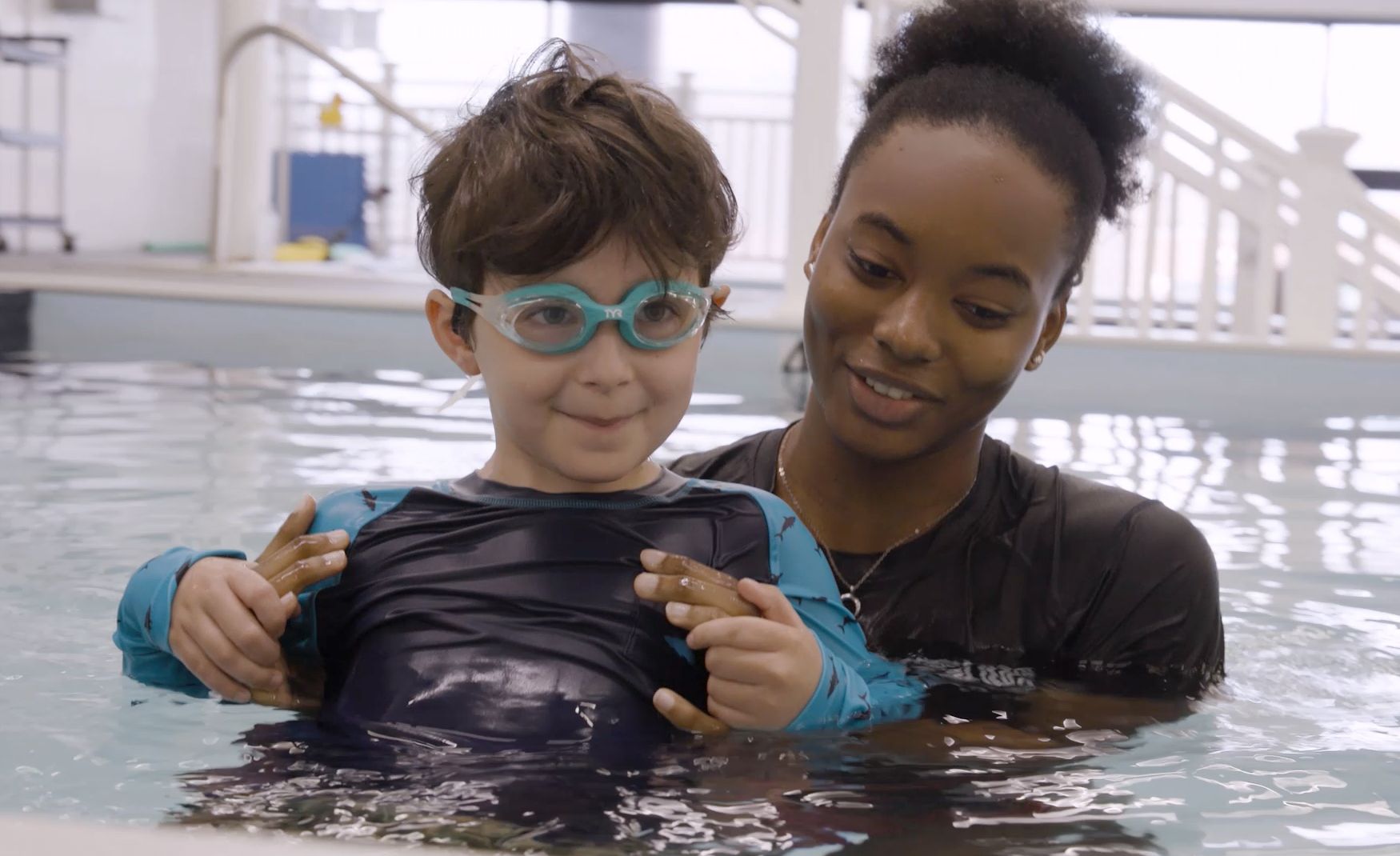 Picture of a swim instructor with child student