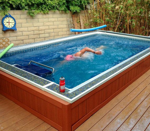 Picture of a triathlete training at home in his Endless Pool